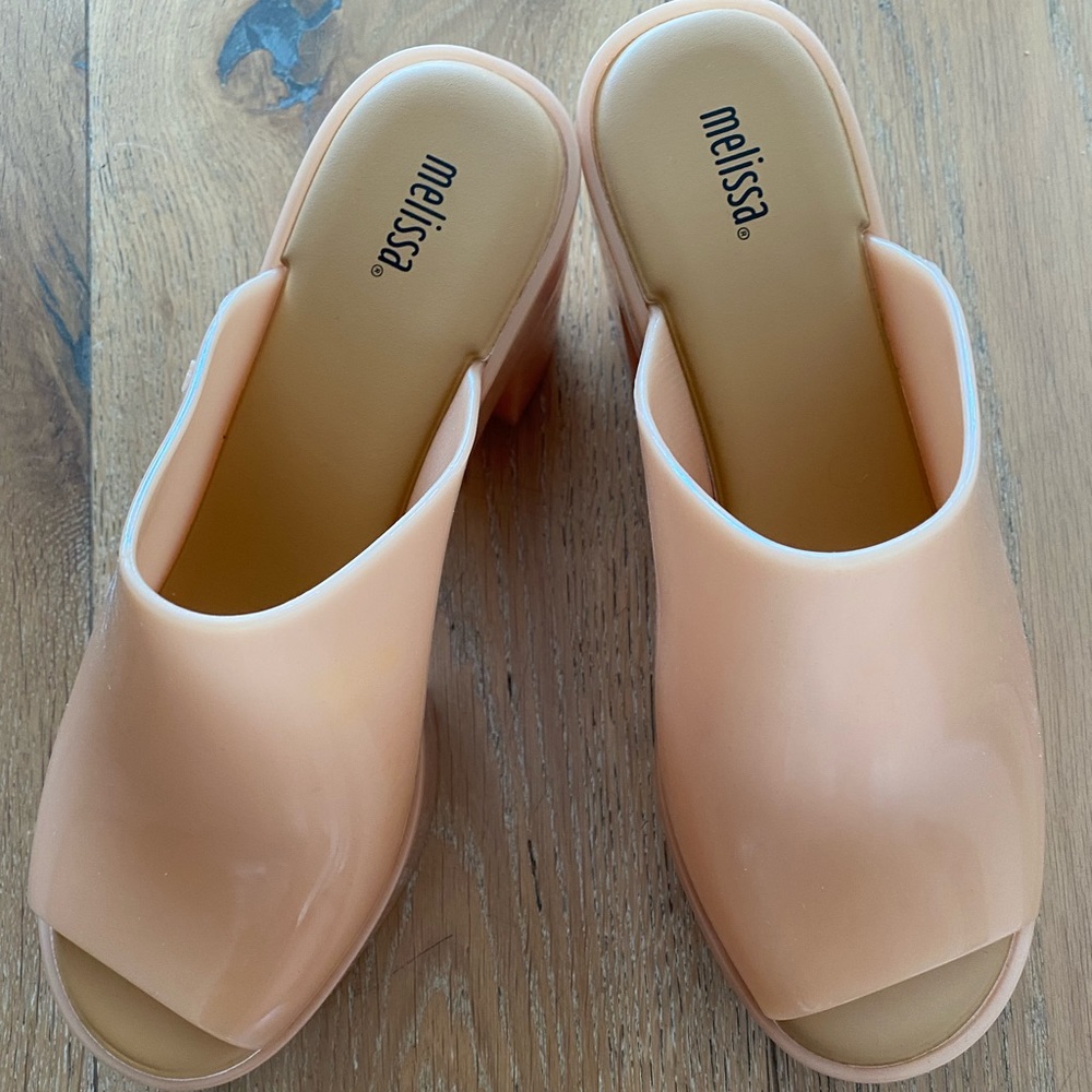 Melissa nude jelly heels. Never been worn. Size 9.